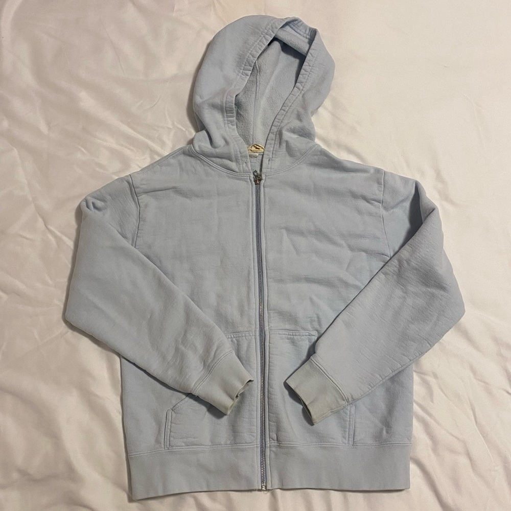 light blue zip up